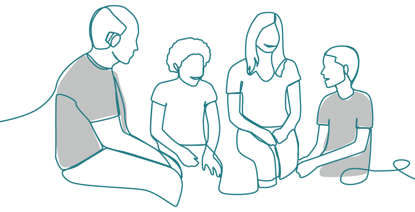 Two adults and two children sitting together