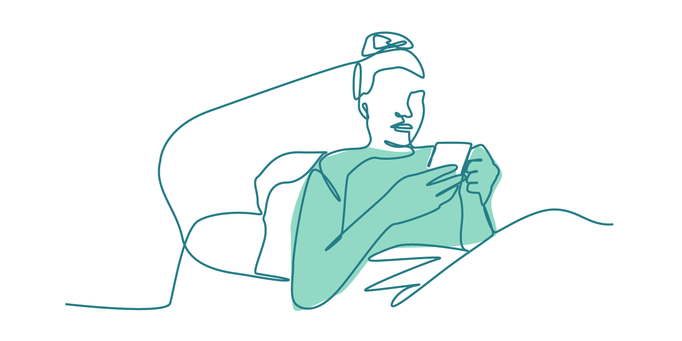 A person looking at their phone while sitting up in bed