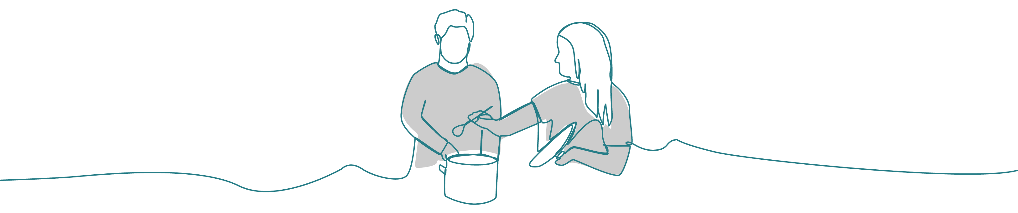 Two people cooking together